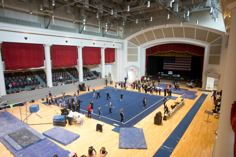 Gymnasts warm up on the floor on Saturday, March 15, 2014, during the Iowa State Optional Gymnastics Championships at Veterans Memorial Coliseum in Cedar Rapids, Iowa. This is the first time the building was opened for event since the flood in 2008. (Justin Wan/The Gazette-KCRG TV9)