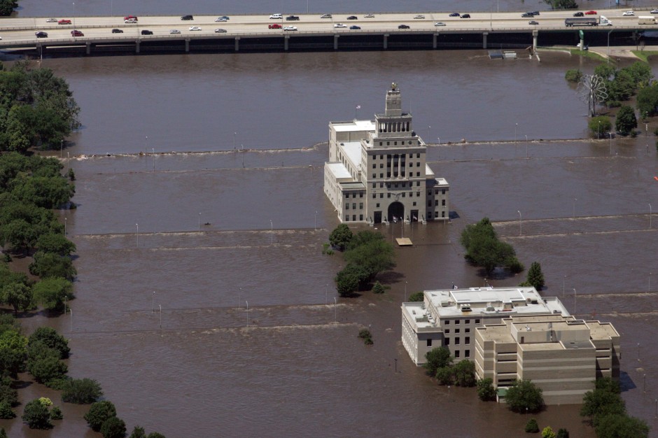 Mays Island, which holds Cedar Rapids court house, is now submerged under flood water after the Cedar River overflowed its banks, Friday, June 13, 2008 in Cedar Rapids, Iowa. For decades, Cedar Rapids escaped any major, widespread flooding, even during the Midwest deluge of 1993, and many people had grown confident that rising water would pose no danger to their city. The flood this time didn